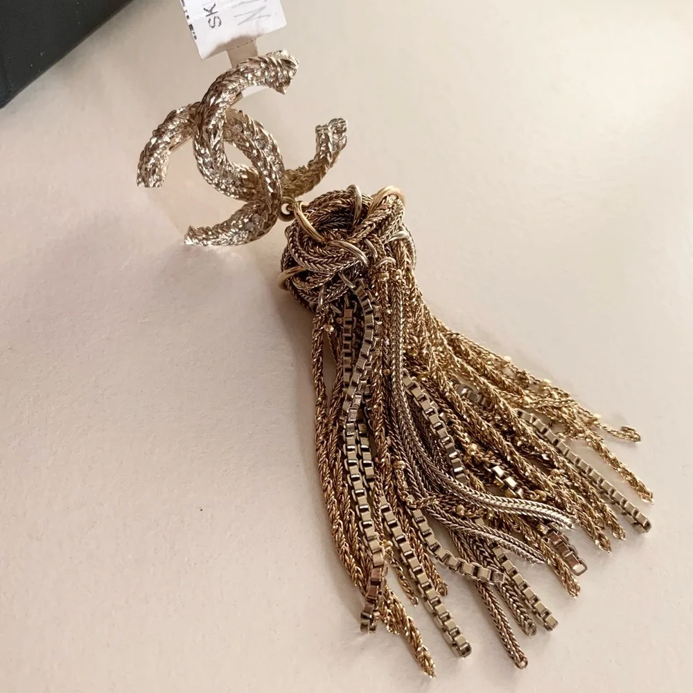 Chanel large tassel brooch in gold with crystals